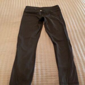 Lululemon mid rise black tights size 4